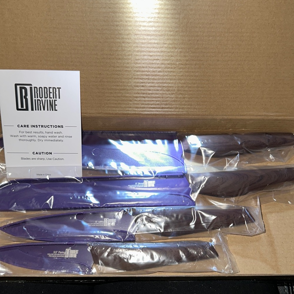 NIP ROBERT IRVINE  4 pc PURPLE KNIFE SET